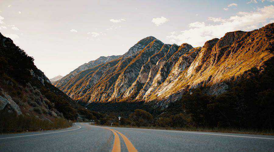 Road Winding Through Mountains desktop wallpaper hd 4k high-resolution