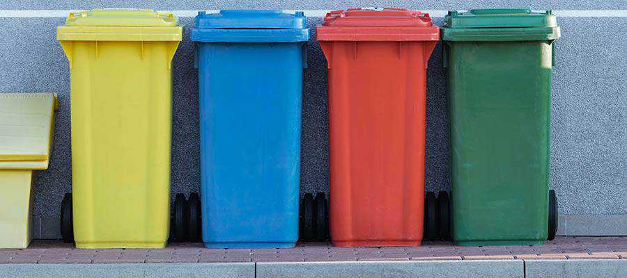 Trash and recycling bins.