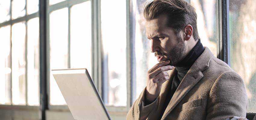 Man looking at a computer screen.